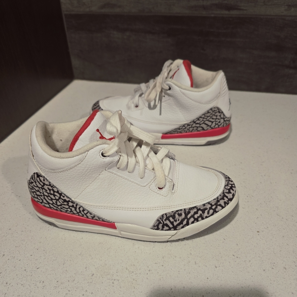 Air Jordan White and Red Sneakers